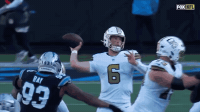 A Football Player Wearing Number 6 Throws The Ball GIF