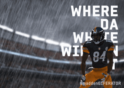 A Football Player Wearing Number 84 Is Standing In The Rain GIF
