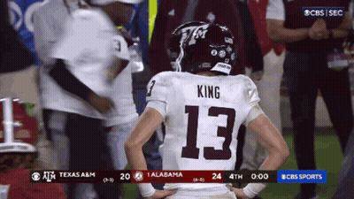 A Football Player Wearing The Number 13 Stands On The Field GIF