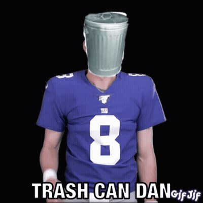A Football Player With A Trash Can On His Head Giving A Thumbs Up Sign GIF