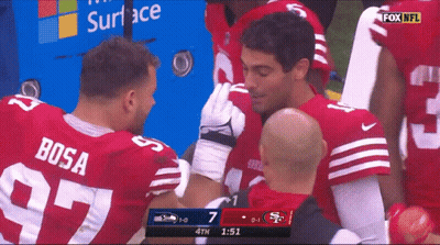 A Football Player With Bosa On The Back Of His Shirt GIF