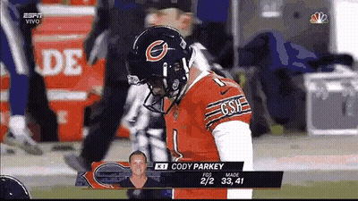 A Football Player With The Name Cody Parkey On The Back Of His Jersey GIF
