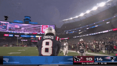 A Football Player With The Name Diggs On His Back GIF