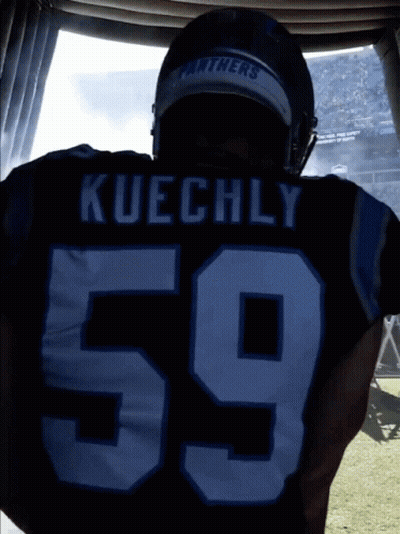A Football Player With The Name Kuechly And The Number 59 On His Jersey GIF