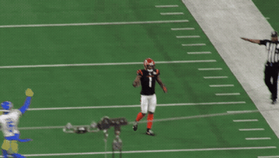 A Football Player With The Number 1 On His Jersey Catches A Ball GIF
