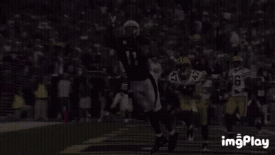 A Football Player With The Number 1 On His Jersey Is Catching The Ball GIF