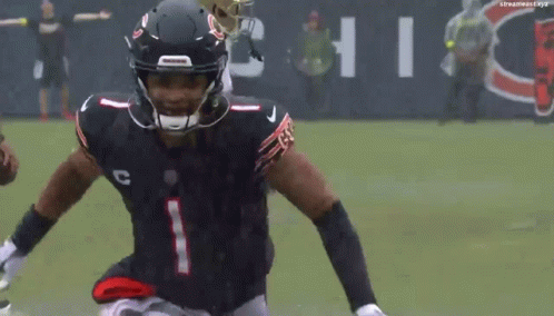 A Football Player With The Number 1 On His Jersey Is Running On The Field GIF