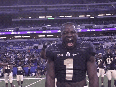 A Football Player With The Number 1 On His Jersey Is Screaming GIF