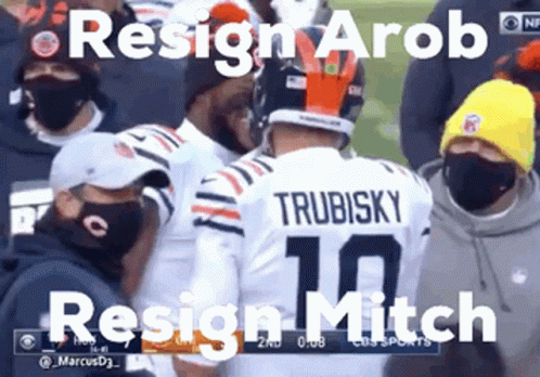 A Football Player With The Number 10 On His Back Talks To Another Player GIF
