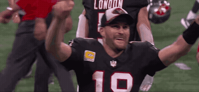A Football Player With The Number 10 On His Jersey Is Celebrating GIF