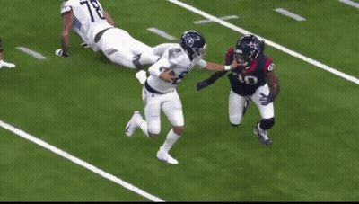 A Football Player With The Number 10 On His Jersey Is Running On The Field GIF