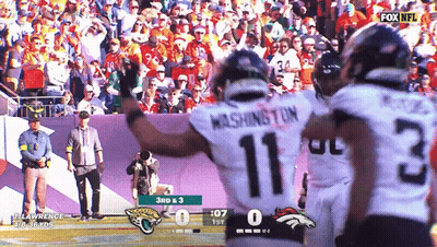 A Football Player With The Number 11 On His Back GIF