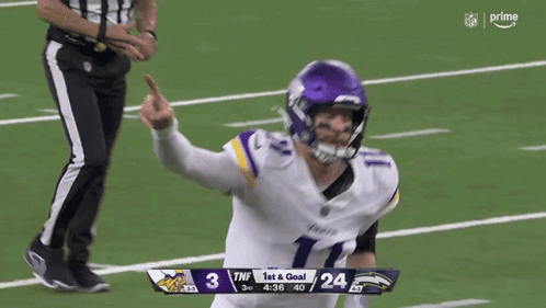 A Football Player With The Number 11 On His Jersey Is Giving A Thumbs Up GIF