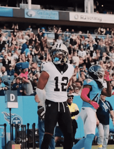 A Football Player With The Number 12 On His Shirt GIF