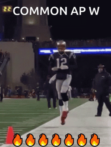 A Football Player With The Number 12 On The Back Of His Jersey GIF