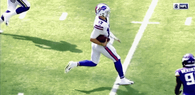 A Football Player With The Number 13 On His Jersey Runs With The Ball GIF