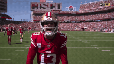 A Football Player With The Number 13 On His Shirt GIF
