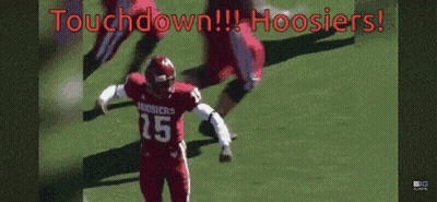 A Football Player With The Number 15 On His Jersey Is On The Field GIF