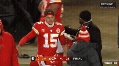 A Football Player With The Number 15 On His Jersey Stands On The Field GIF