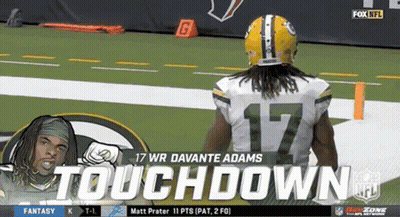 A Football Player With The Number 17 On His Jersey Stands On The Field GIF