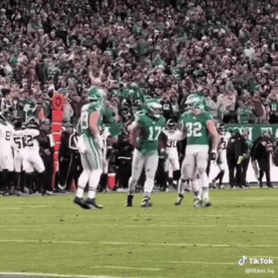 A Football Player With The Number 17 On His Jersey Stands On The Field GIF