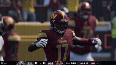 A Football Player With The Number 17 On His Jersey Stands On The Field GIF