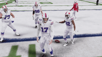 A Football Player With The Number 17 On His Jersey Stands On The Field GIF
