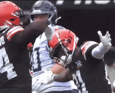 A Football Player With The Number 18 On His Back GIF