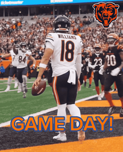 A Football Player With The Number 18 On His Jersey Stands On The Field GIF