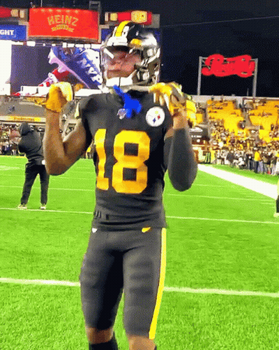 A Football Player With The Number 18 On His Shirt GIF