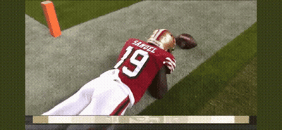 A Football Player With The Number 19 On His Jersey Is Laying On The Field GIF