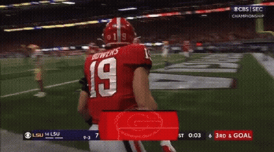 A Football Player With The Number 19 On His Jersey Is Running On The Field GIF