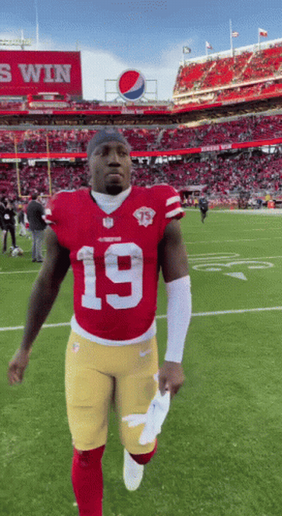 A Football Player With The Number 19 On His Shirt GIF