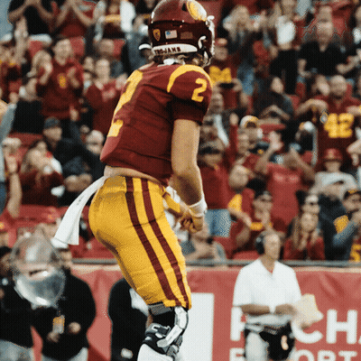 A Football Player With The Number 2 On His Jersey Is Running On The Field GIF