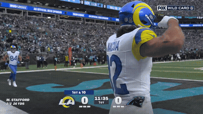 A Football Player With The Number 2 On His Jersey Stands On The Field GIF