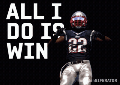 A Football Player With The Number 22 On His Jersey Stands In Front Of The Words All I Do Win GIF