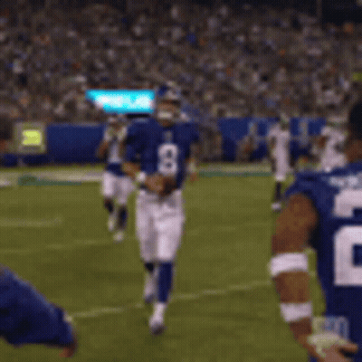 A Football Player With The Number 26 On His Back Is Running On The Field GIF