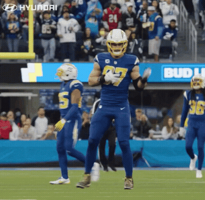 A Football Player With The Number 27 On His Uniform GIF