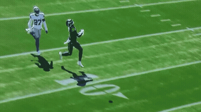A Football Player With The Number 27 On Their Jersey GIF