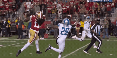 A Football Player With The Number 29 On His Jersey Is Running On The Field GIF