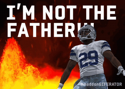 A Football Player With The Number 29 On His Jersey Is Standing In Front Of A Fire GIF