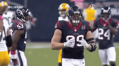 A Football Player With The Number 29 On His Jersey Stands On The Field . GIF
