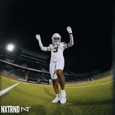 a football player with the number 3 on his uniform