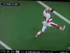 A Football Player With The Number 31 On His Jersey Is Running On The Field GIF