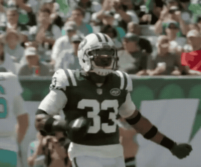 A Football Player With The Number 33 On His Uniform GIF