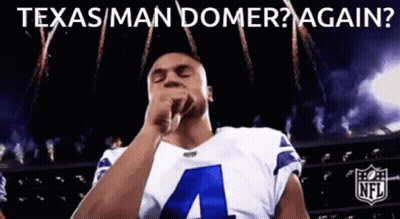 A Football Player With The Number 4 On His Jersey Covering His Mouth With His Fist GIF