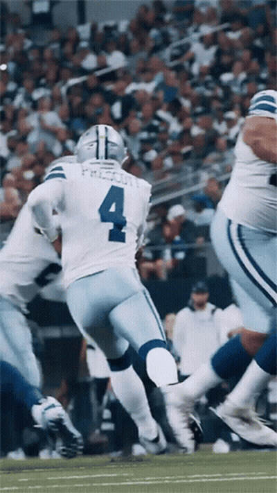 A Football Player With The Number 4 On His Jersey Is Running On The Field GIF
