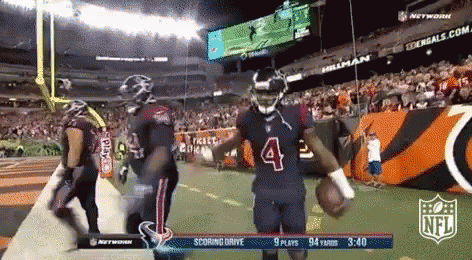 A Football Player With The Number 4 On His Jersey Is Running On The Field GIF