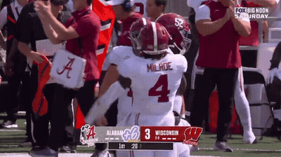 A Football Player With The Number 4 On His Jersey GIF