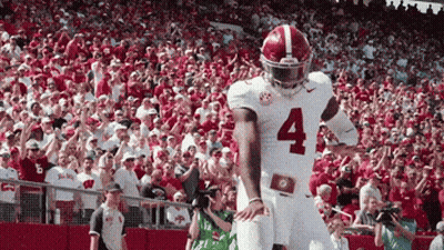 A Football Player With The Number 4 On His Uniform GIF